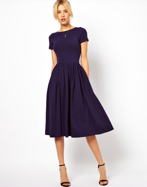 Dark blue, short-sleeved midi dress with a fit and flare with matching open toe heels