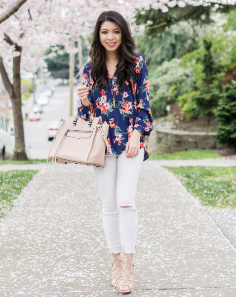 Dark blue shirt with floral pattern and white jeans