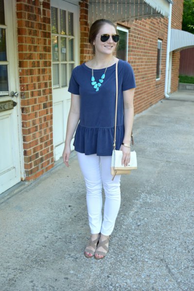 Dark blue peplum short-sleeved top with white jeans