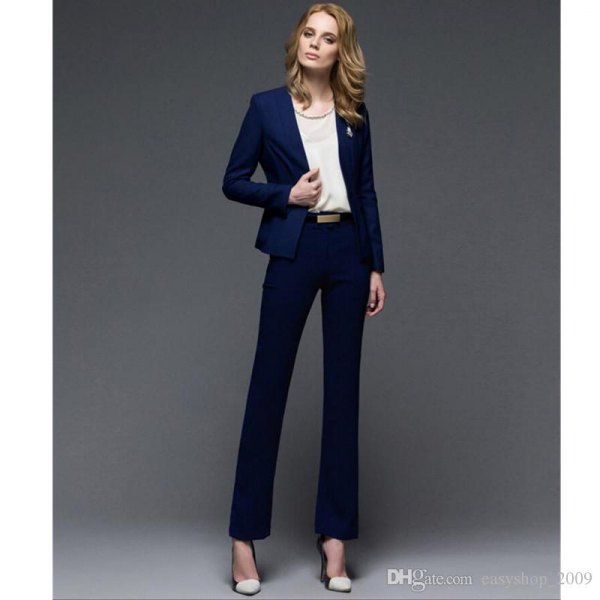 Dark blue slim fit blazer with chiffon top and dress pants with straight legs