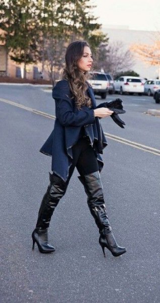 Dark blue pullover jacket with black leather over the knee-high boots