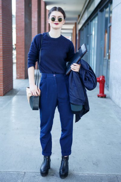 Dark blue sweater with matching pants and leather boots