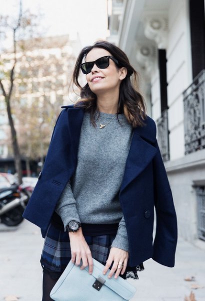 Dark blue wool blazer with cashmere sweater and checked mini skirt