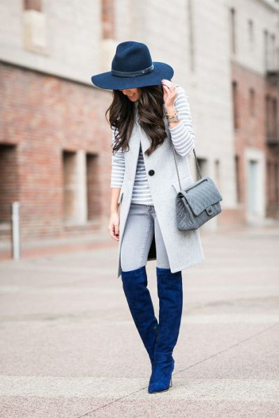 Navy felt hat to match knee-high suede boots