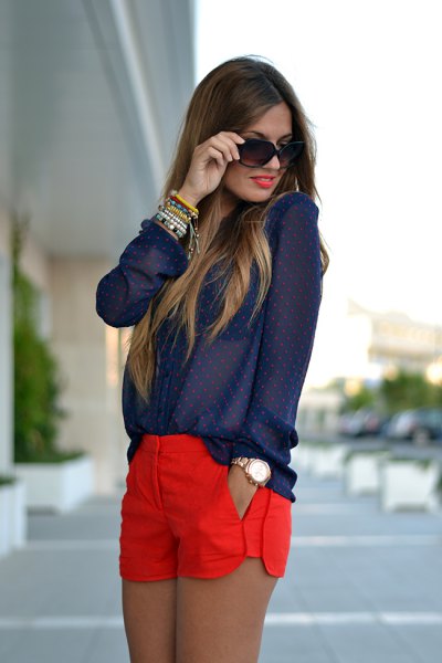 Navy dotted shirt with buttons with red shorts