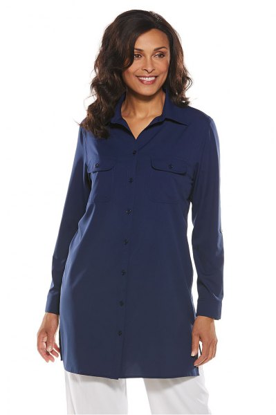 Navy tunic shirt with white wide leg jeans