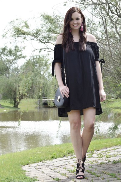Off-the-shoulder mini dress with black lace-up sandals