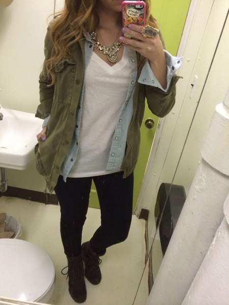 olive green military jacket with light blue chambray shirt