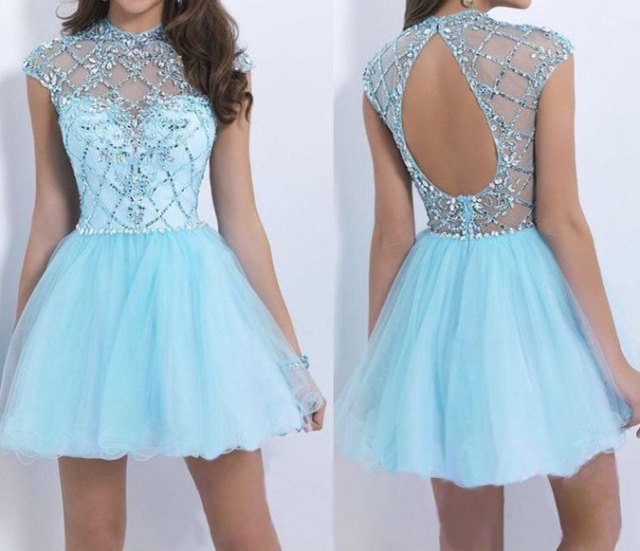 Mini fit with an open back and a light blue and silver flare dress