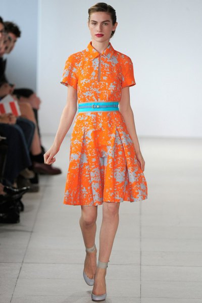 orange printed pleated dress with collar and belt