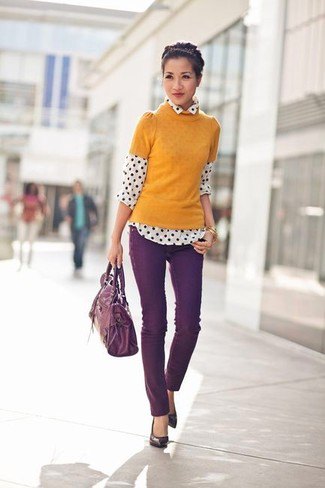 orange short sleeve sweater with white and black polka dot shirt