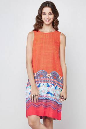 sleeveless, knee-length sheath dress with an orange tribal print