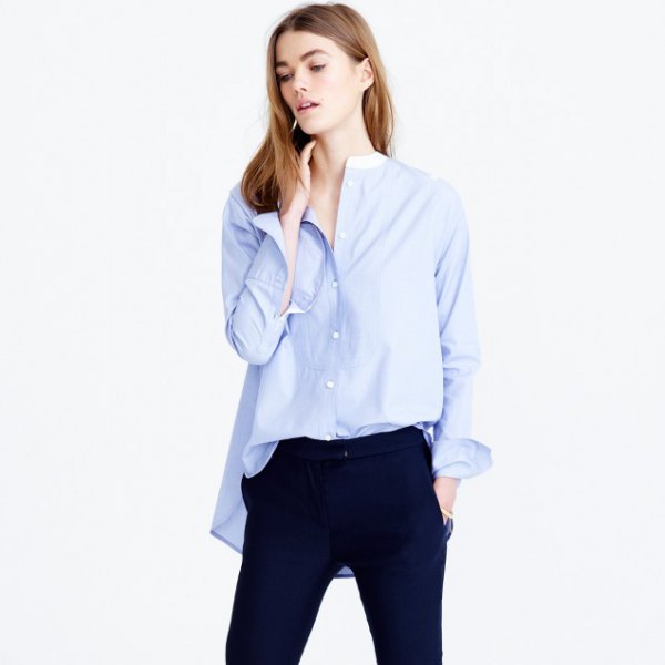 Oversized sky blue shirt without a collar with dark blue jeans