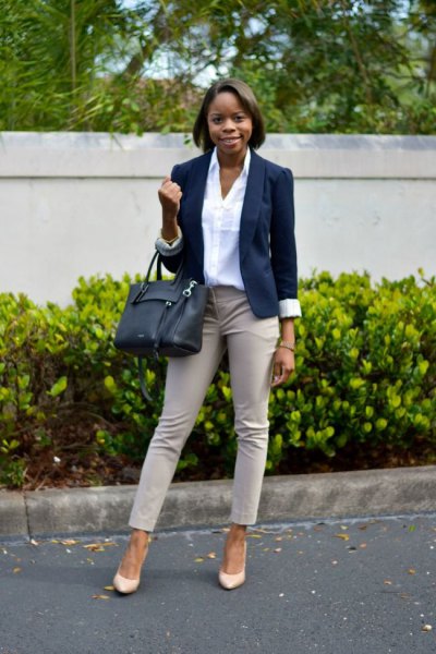 Light pink ankle pants with white shirt and dark blue blazer