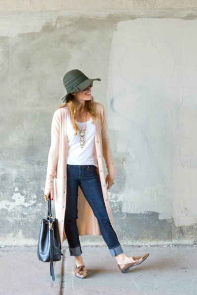 Light pink duster sweater with a gray floppy hat