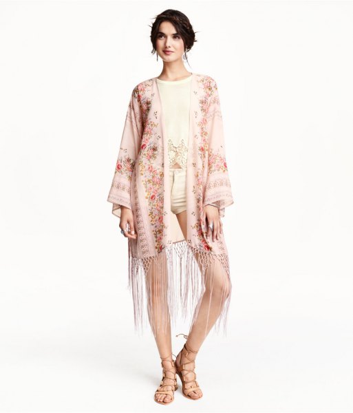 light pink kimono with yellow floral fringes, light yellow shorts