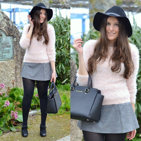Light pink fuzzy sweater with a gray wool mini skirt