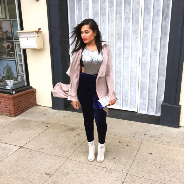 Light pink long blazer with a silver sequin tank top and dark blue leggings