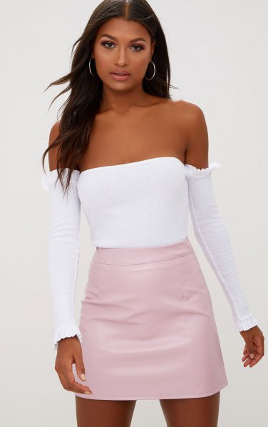 Light pink skirt with a white tube top and separate long sleeves