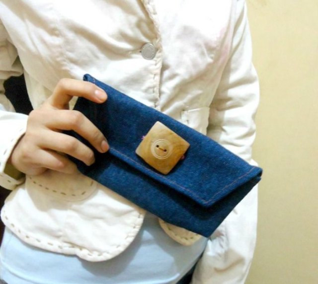 light yellow buttoned linen blouse with a cute mini purse made of blue denim