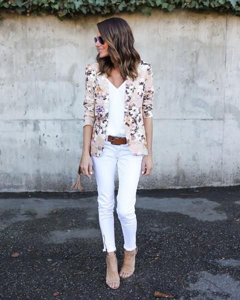 pink blazer with white top with V-neck and matching cropped jeans
