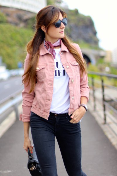pink denim jacket with white printed t-shirt and light blue silk choker scarf