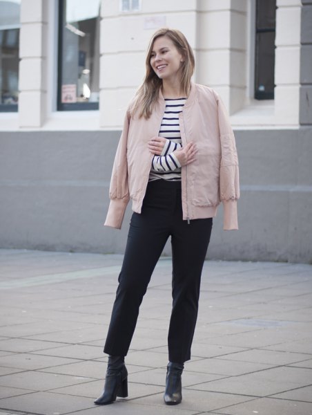 pink jacket black and white striped t-shirt