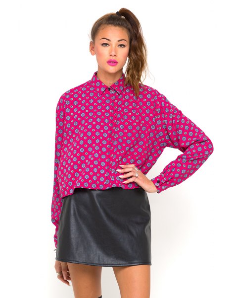 pink printed bat shirt black leather mini skirt