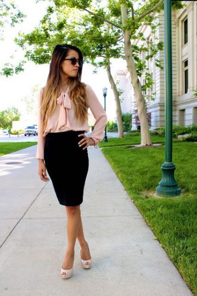 Chiffon blouse with pink bow and black pencil skirt