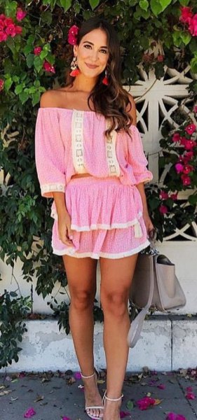 pink ruffle mini skirt from shoulder up