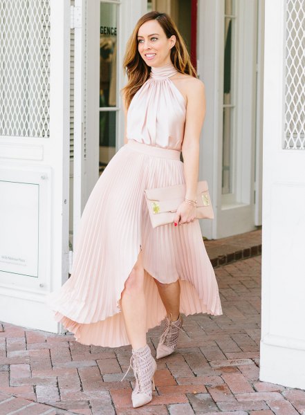 Top made of pink silk halter with asymmetrical, blushing maxi pleated skirt