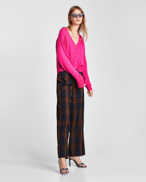 pink cardigan with V-neck and checkered pants in green and navy