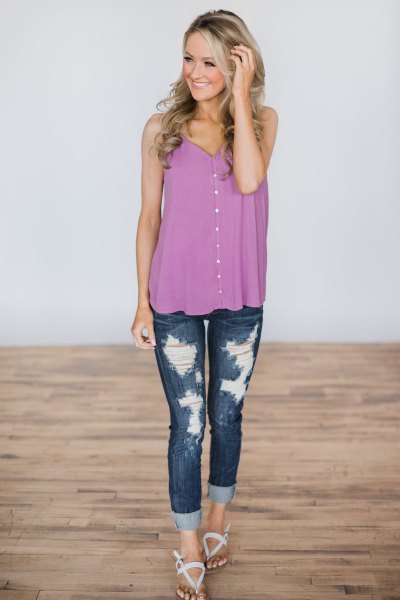 purple buttoned waistcoat with ripped skinny jeans
