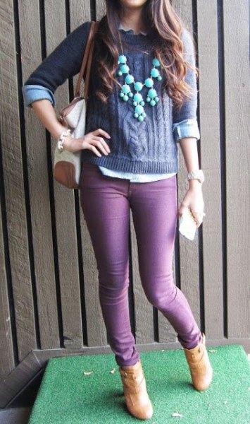purple knitted sweater with matching skinny jeans