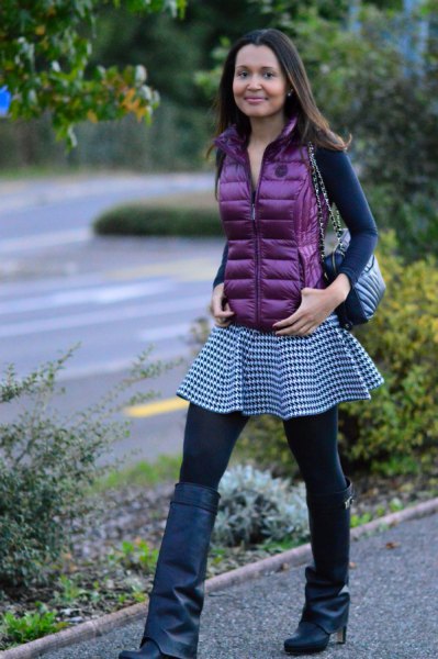 purple down vest with long-sleeved, figure-hugging T-shirt and checked tunic