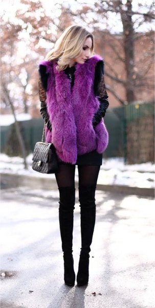 purple faux fur vest with black skinny jeans