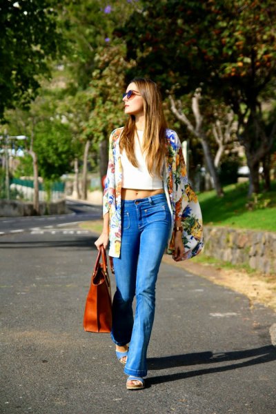 Rainbow-colored printed oversized blazer with light blue boot cut jeans