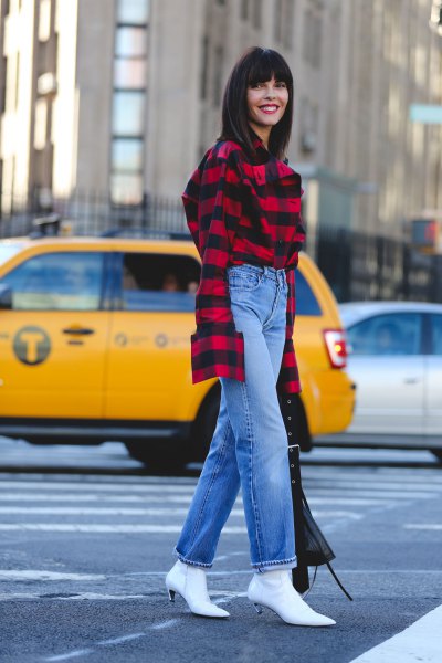 red and black checked shirt with blue jeans with straight cut and white boots with kitten heel