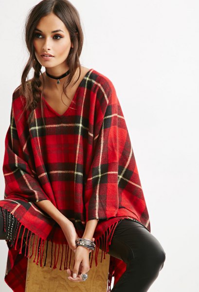 red and black poncho leather gaiters with checked V-neckline and fringes