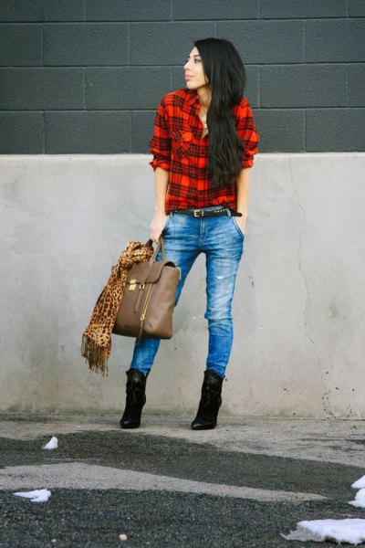 red and black shirt with blue jeans and suede ankle boots with heel