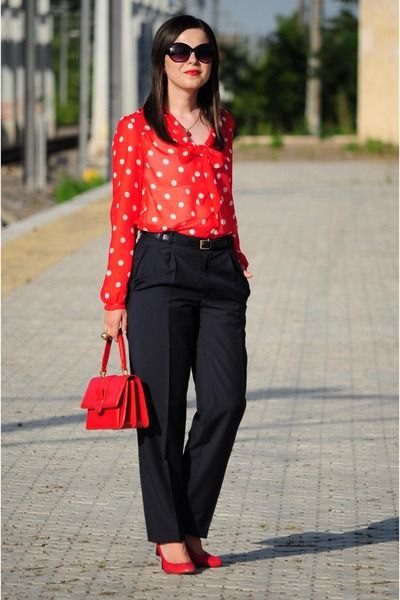 red and white polka dot shirt, black chinos with wide legs