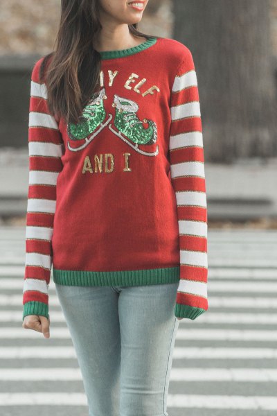 red and white striped knitted sweater with round neckline and light gray skinny jeans