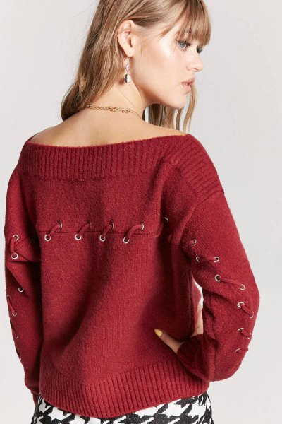 red sweater with boat neckline lace details