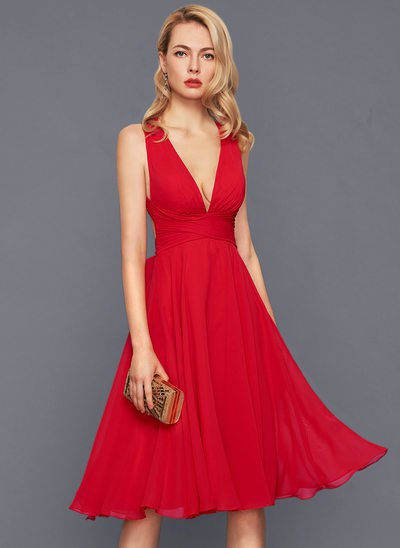 red, deep midi dress with V-neck and flared midi dress with clutch wallet