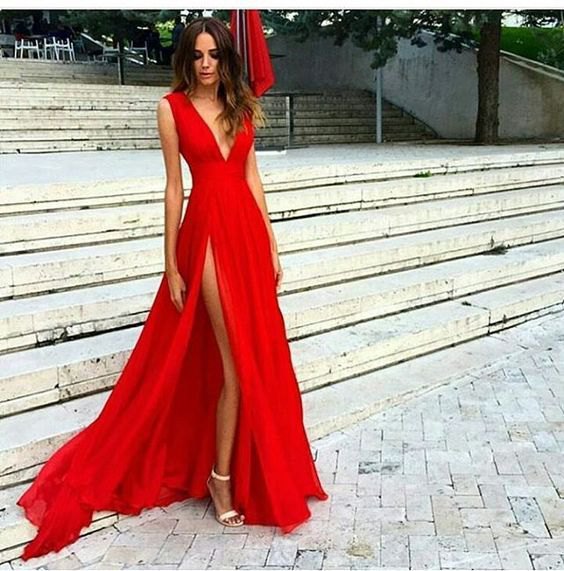 red deep, split, flowing dress with deep V-neckline