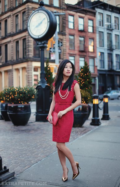 red gathered knee-length dress with sheath at the waist