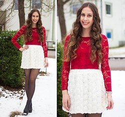 red, long-sleeved, figure-hugging lace top with white, high-waisted mini skirt