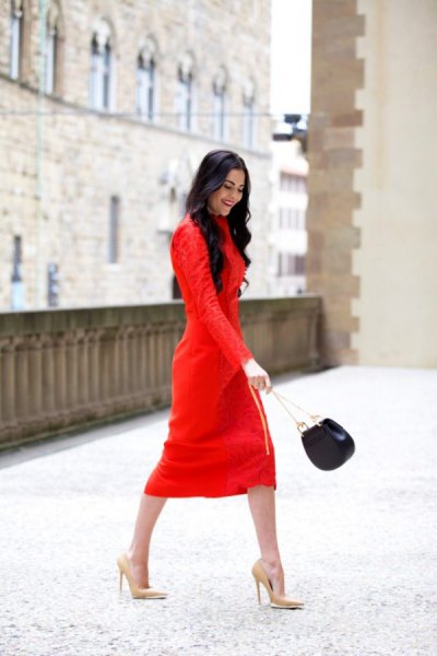 red long-sleeved midi shift dress with pink high heels with pointy toes