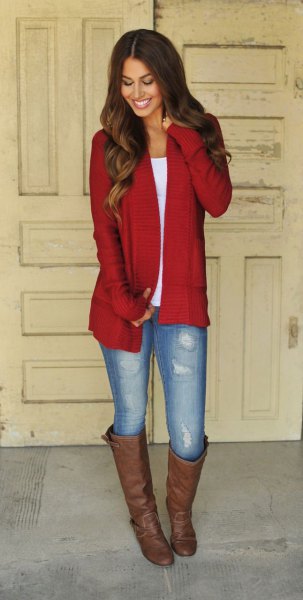 red longline cardigan with white t-shirt with scoop neck and brown knee-high boots