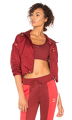 red mini bomber jacket with crop top and running shorts